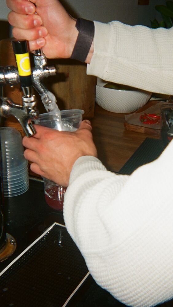 A spritz being poured from the tap tower